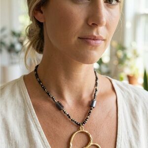 Elegant Gold and Black Heart Pendant Necklace